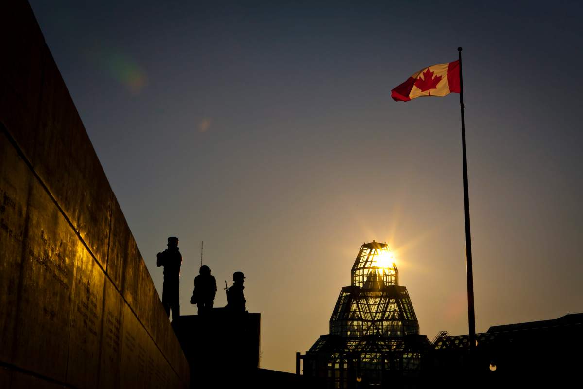 The sun sets on the Reconciliation the Peacekeeping Monument and the National Gallery of Canada in Ottawa Sunday April 29, 2012. The Canadian Press Images/Francis Vachon