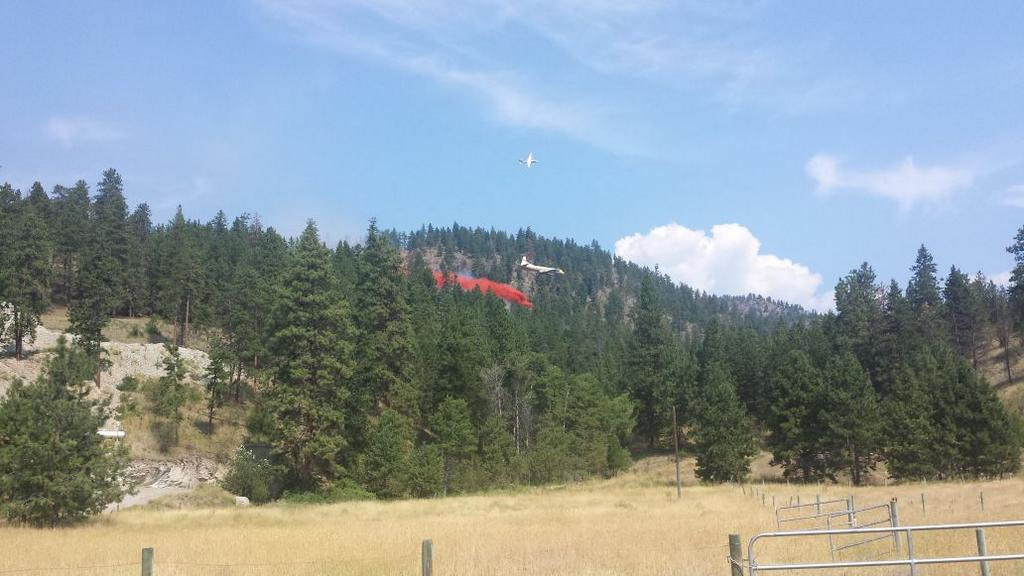 Retardant lines were dropped from the air above Peachland Monday. The fire near Pincushion Mtn is believed to be human caused. 