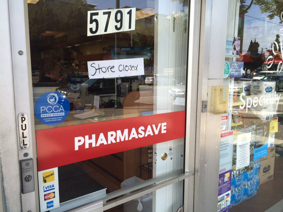 A sign at the Pharmacy that was allegedly robbed on Oak Street.