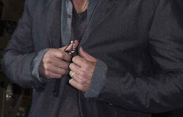 Brad Pitt wears a wedding ring during a photo call for his movie ‘Fury’ on Aug. 28, 2014.