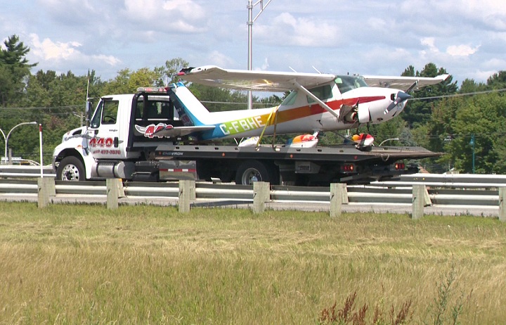 A light plane crash landed on a Quebec highway near Terrebonne, Que. on August 8, 2014.