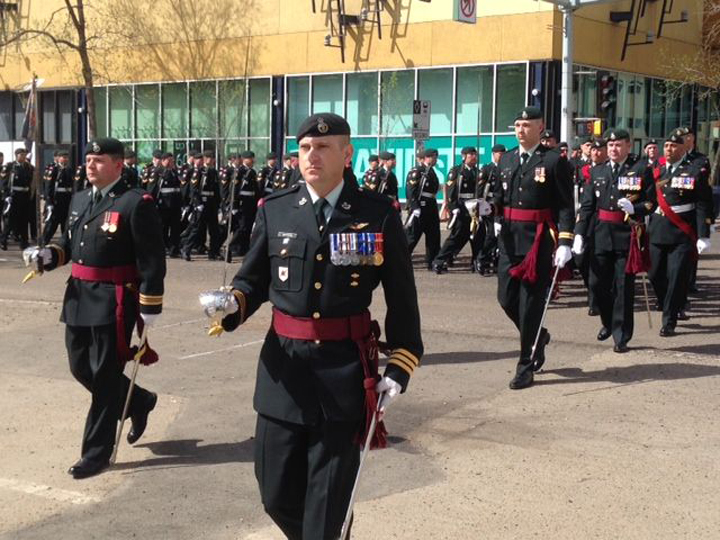 The Princess Patricia's Canadian Light Infantry march through Edmonton to commemorate their 100th anniversary earlier in August. Their commemorative baton relay runs through Winnipeg Thursday.