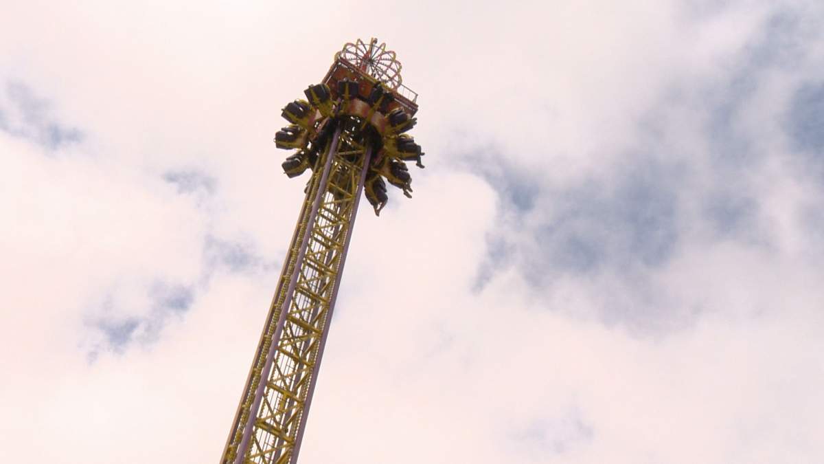 Riders await the inevitable drop on a ride at the Queen City Ex on Saturday.