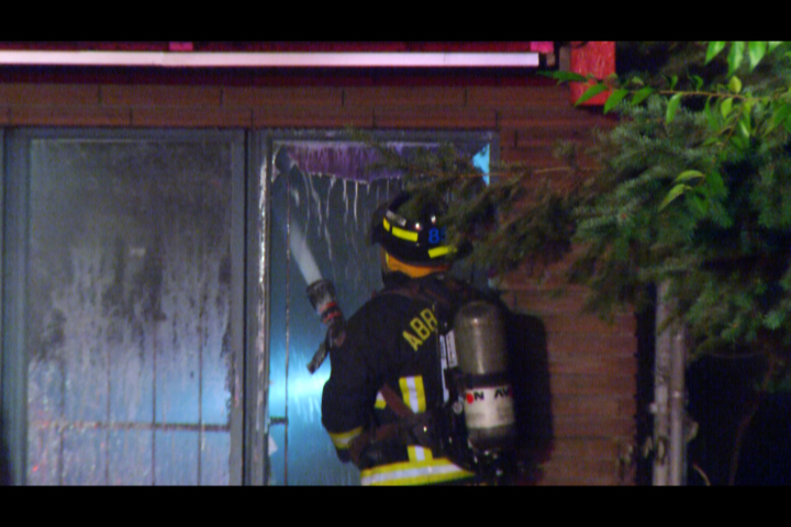 Fire crews battle flames at an old gas station in Abbotsford - image