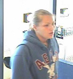 Police arrest 26 year old woman in Winnipeg bank robbery - image
