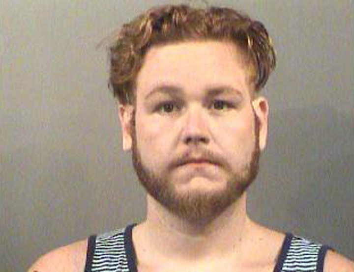 This image provided by the Sedgwick County Jail shows Seth Jackson, who has been charged with first-degree murder in the death of his 10-month-old foster daughter who he left in a hot car on July 24 in Wichita, Kansas.