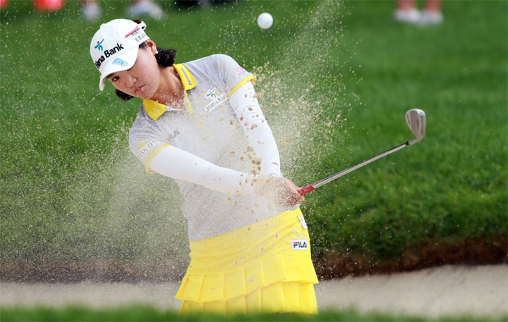 So Yeon Ryu of South Korea chips out of the sand trap on the 4th hole during the second round of the LPGA Canadian Pacific Women's Open at the London Hunt and Country Club on August 22, 2014 in London, Ontario.