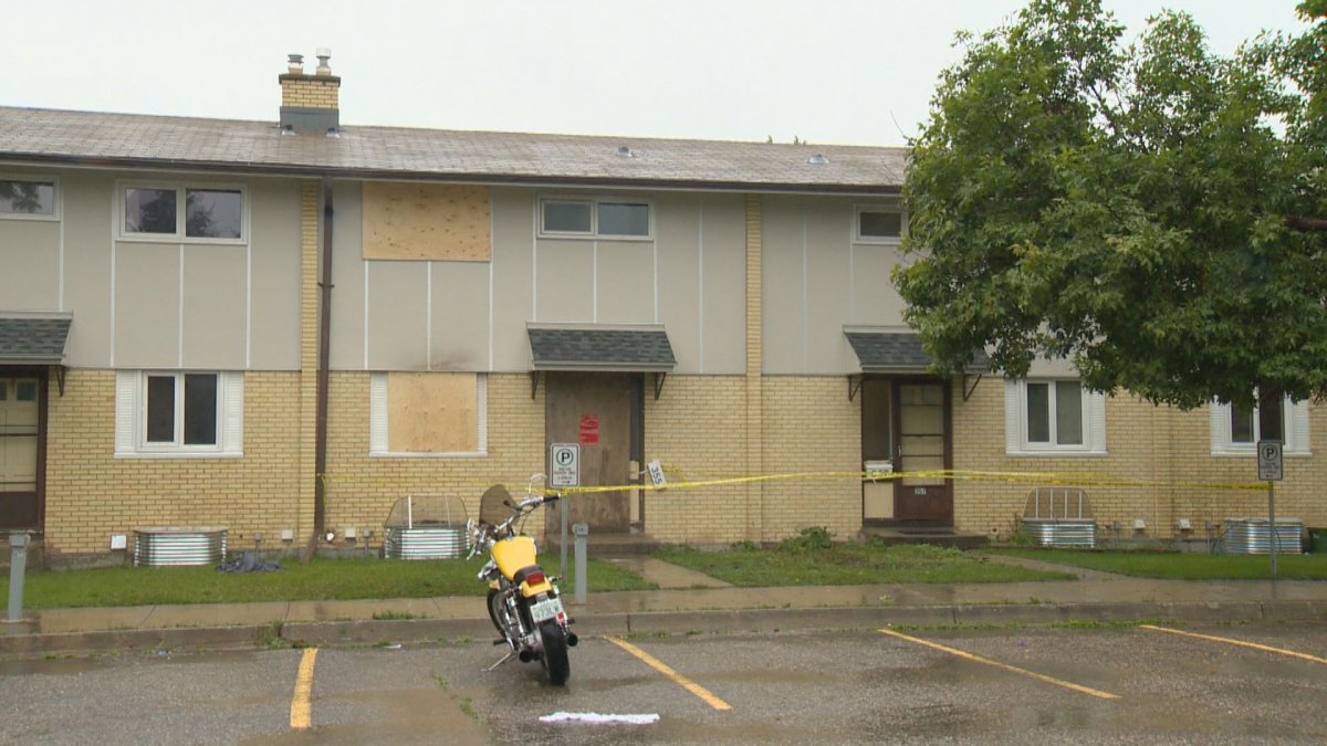Two men were rushed to hospital suffering from smoke inhalation after they were rescued from a burning townhouse in Regina.