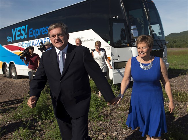 New Brunswick Premier David Alward and his wife Rhonda arrive in the rural community of Penobsquis to launch his re-election bid on Aug. 21, 2014.