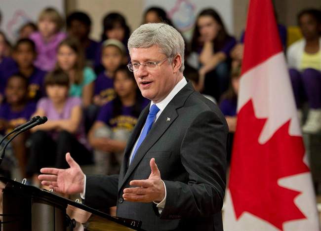 Prime Minister Stephen Harper announces funding towards the prime minister's maternal, newborn and child health initiative at Davisville Pulbic School in Toronto on Thursday, May 29, 2014. 