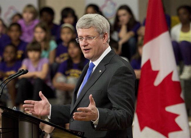 Prime Minister Stephen Harper announces funding towards the prime minister's maternal, newborn and child health initiative at Davisville Pulbic School in Toronto on Thursday, May 29, 2014. 