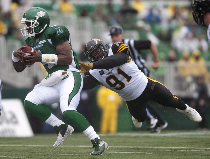 The Tiger-Cats dealt defensive end Brandon Boudreaux and two draft picks to the Roughriders for a pair of picks and a negotiation-list player Wednesday.