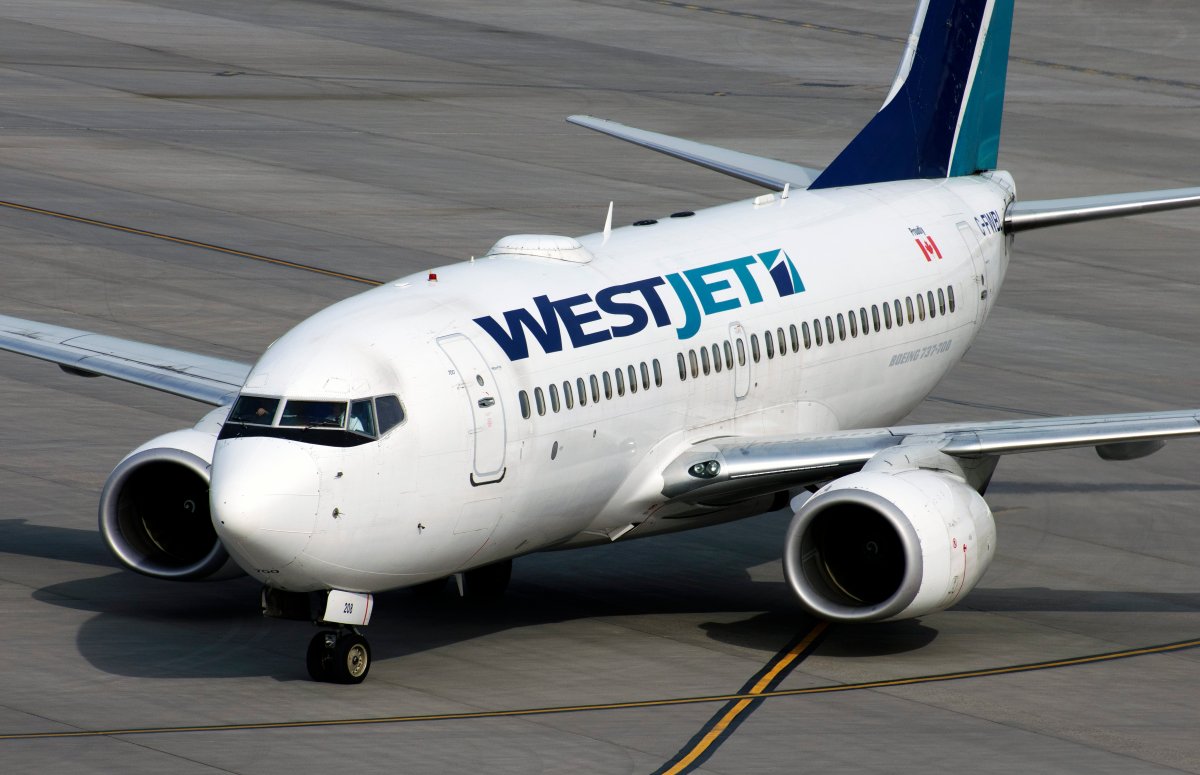 A Boeing 737 (737-700) airliner, belonging to WestJet Airlines, in Calgary in 2014.
