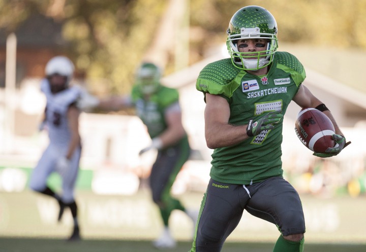 Saskatchewan Roughriders slotback Weston Dressler runs the ball against the Ottawa Redblacks during the forth quarter CFL football action at Mosaic Stadium on Sunday, September 21, 2014 in Regina.