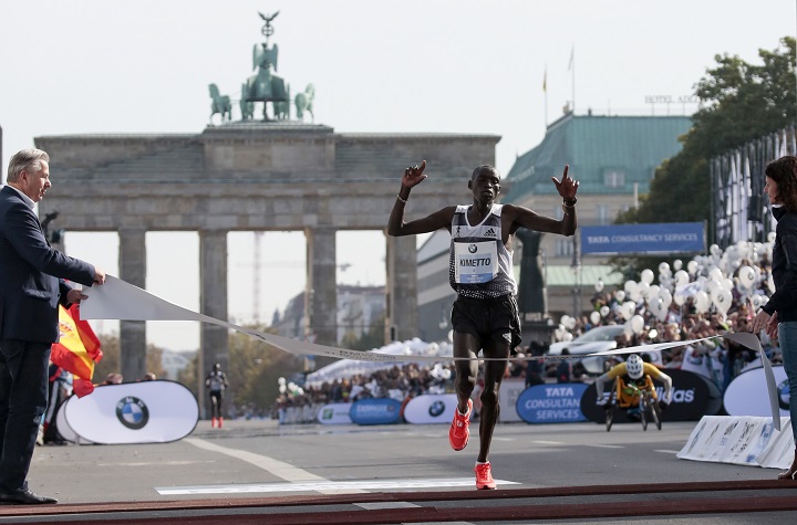 Dennis Kimetto from Kenya crosses the finish line to win the 41th Berlin Marathon in Berlin, Germany, Sunday, Sept. 28, 2014.
