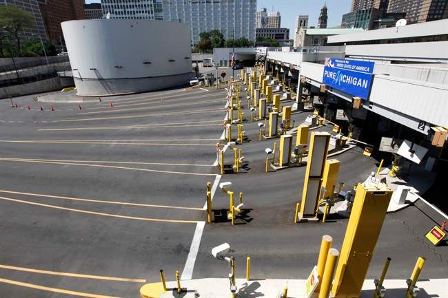 The lanes entering the United States at the Detroit Windsor Tunnel is pictured on July 12, 2012. THE CANADIAN PRESS/AP, Paul Sancya.