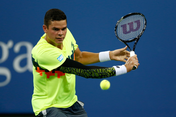 Milos Raonic of Canada in action against Kei Nishikori of Japan on Day Eight of the 2014 US Open at the USTA Billie Jean King National Tennis Center on September 1, 2014 in the Flushing neighborhood of the Queens borough of New York City. 