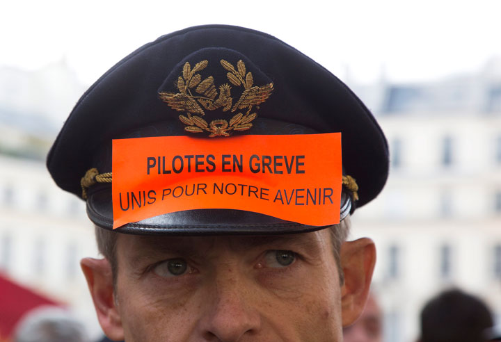 French pilots of Air France company demonstrate near French Parliament in Paris, France, on September 23, 2014.