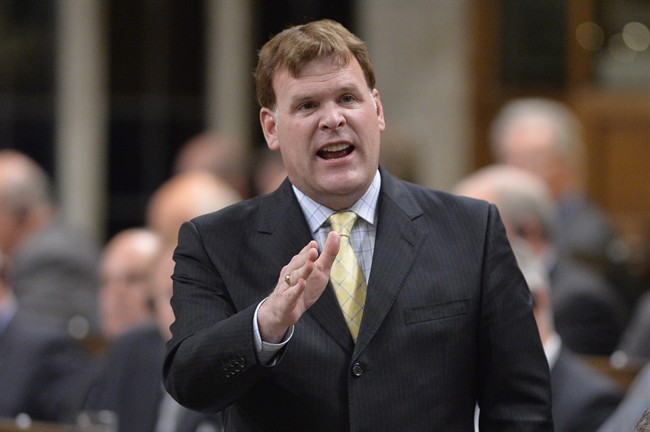 Foreign Affairs Minister John Baird answers a question during Question Period in the House of Commons on Parliament Hill in Ottawa, Thursday, Sept.18, 2014 .