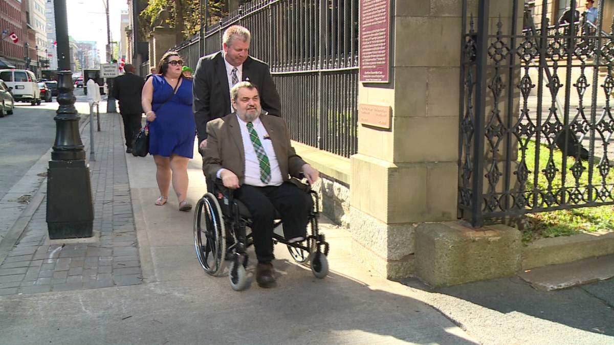 Alfie MacLeod arrives at Province House Sept. 25, 2014.