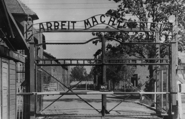 FILE - This undated file image shows the main gate of the Nazi concentration camp Auschwitz I, near Oswiecim , Poland, which was liberated by the Russians in January 1945. German prosecutors say they’ve charged a 93-year-old man with 300,000 counts of accessory to murder for serving as a guard at the Nazis’ Auschwitz death camp. The charges against Oskar Groening come as part of a nationwide push against former Auschwitz guards launched last year. Unlike most of the others, Groening has openly talked about his time as a guard and says while he witnessed horrific atrocities, he did not commit any crimes himself. But Hannover prosecutors said in a statement Monday Sept. 15, 2014 he was a cog in the machinery of destruction during his time at Auschwitz in 1944, noting that he helped collect and tally money stolen from murdered inmates.