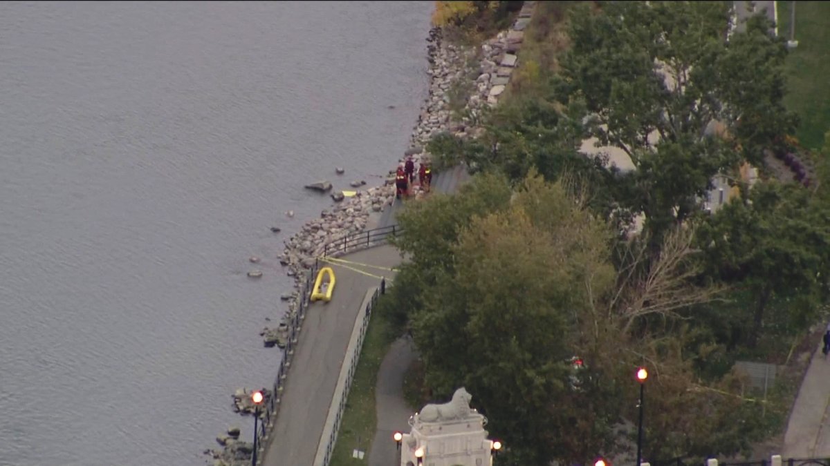 Calgary police investigate after a body was discovered in the Bow River on Tuesday, September 30th, 2014.