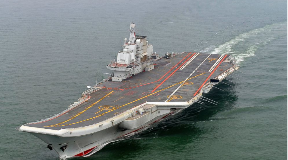 FILE - In this May 2012 file photo provided by China's Xinhua News Agency, Chinese aircraft carrier Liaoning cruises for a test on the sea. Two Chinese test pilots were killed during development of the country's first aircraft carrier fighter wing.