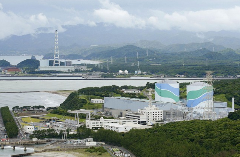 This June 2013 photo shows an overview of Sendai nuclear power plant complex in Sendai, Kagoshima Prefecture, southern Japan. The plant in southern Japan won regulators’ approval Wednesday, Sept. 10, 2014 for meeting safety requirements imposed after the 2011 Fukushima disaster, a key step toward becoming the first reactor to restart under the tighter rules. (AP Photo/Kyodo News) .