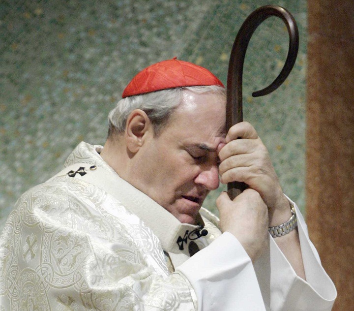 Jean-Claude Cardinal Turcotte gathers his thoughts as he leans on his cane during a memorial mass for Pope John Paul II Saturday, April 2, 2005 in Montreal.