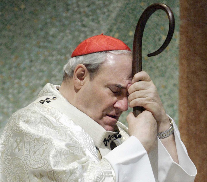 Jean-Claude Cardinal Turcotte gathers his thoughts as he leans on his cane during a memorial mass for Pope John Paul II Saturday, April 2, 2005 in Montreal.