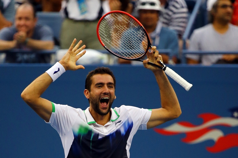 Marin Cilic of Croatia celebrates after defeating Roger Federer of Switzerland during their men's singles semifinal match on Day Thirteen of the 2014 US Open at the USTA Billie Jean King National Tennis Center on September 6, 2014.