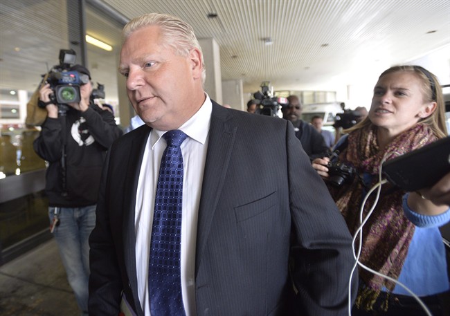 Doug Ford arrives at Mount Sinai Hospital in Toronto, Wednesday, Sept.17, 2014. THE CANADIAN PRESS/Nathan Denette.