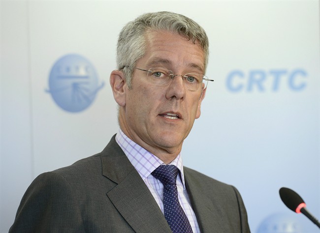 CRTC Chairman Jean-Pierre Blais speaks in Gatineau, Que. on June 27, 2013. THE CANADIAN PRESS/Adrian Wyld.