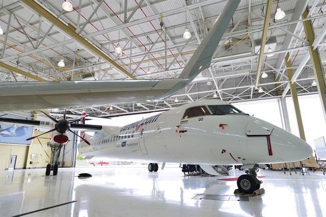 A Bombardier Q400 jet sits in a hangar at the Bombardier facility in Toronto on July 25, 2012.