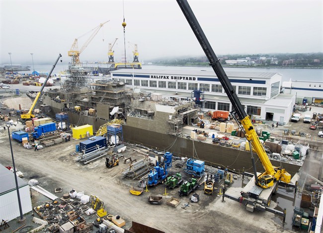 A Navy ship undergoes a mid-life refit at the Irving Shipbuilding facility in Halifax on July 3, 2014. 