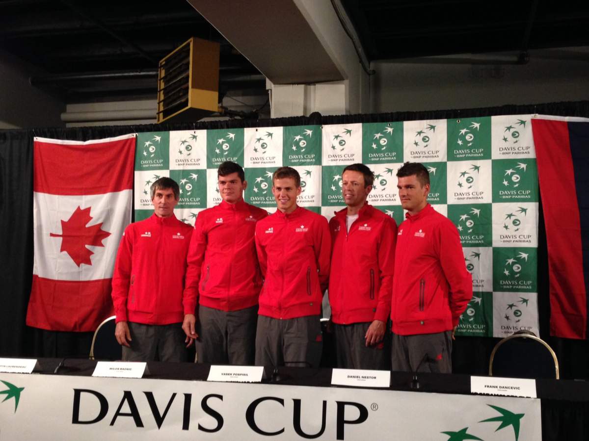 Team captain Martin Laurendeau poses for a photo with Milos Raonic, Vasek Pospisil, Daniel Nestor, and Frank Dancevic.