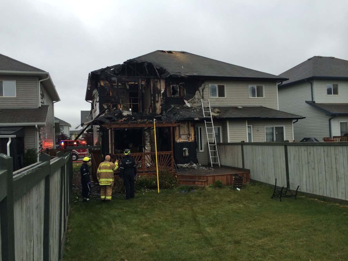 A duplex in southwest Edmonton suffers damage in a fire, Wednesday, September 10, 2014. 