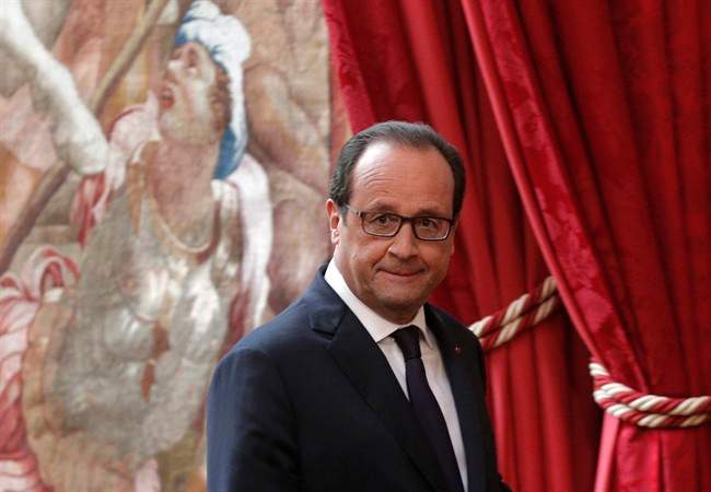 French President Francois Hollande arrives for a press conference at the Elysee Palace, in Paris, Friday, Sept. 19, 2014. 