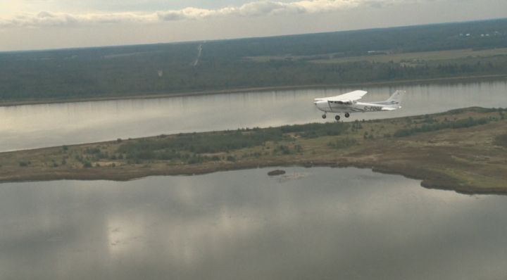 Evan Miller, 17, flies through the skies above Cooking Lake Airport Sunday, September 7, 2014.