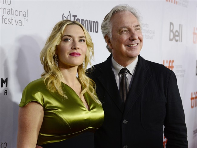Kate Winslet and Alan Rickman arrive on the red carpet for the film “A Little Chaos ” at the Toronto International Film Festival in Toronto on Saturday Sept. 13, 2014.