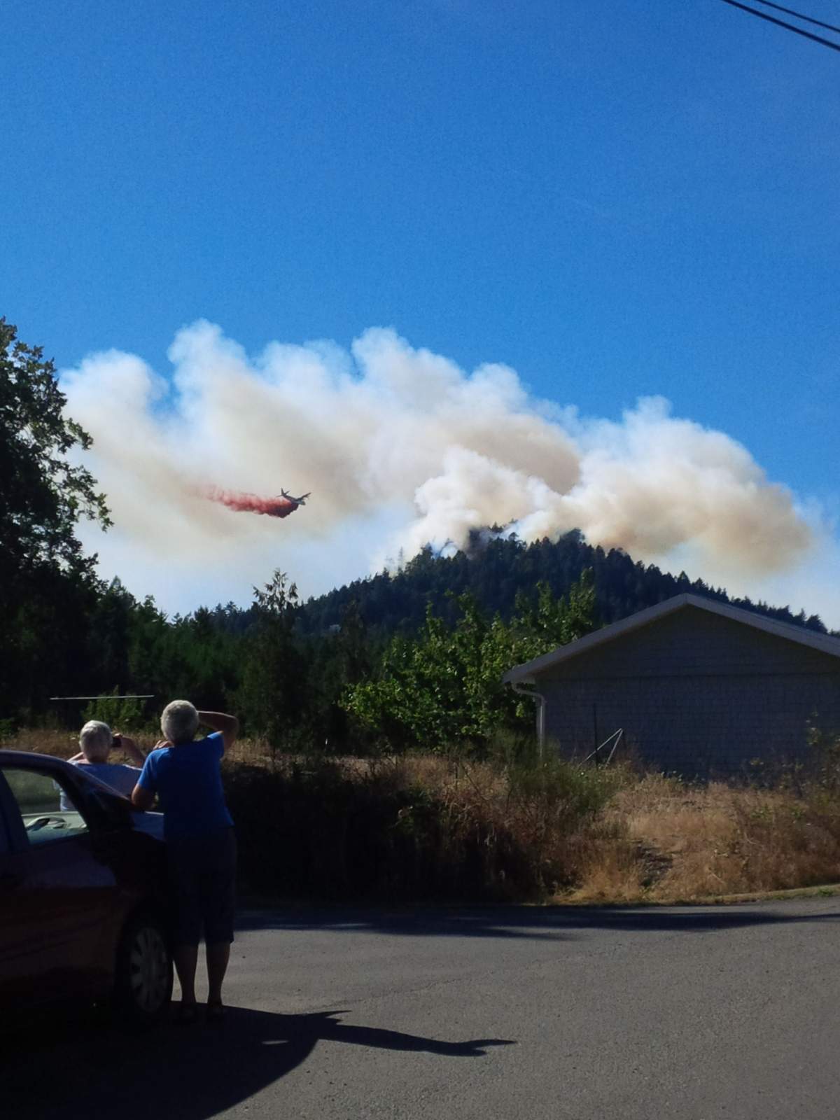 Crews are still on scene battling a brush fire at the top of Mt. Blinkhorn.