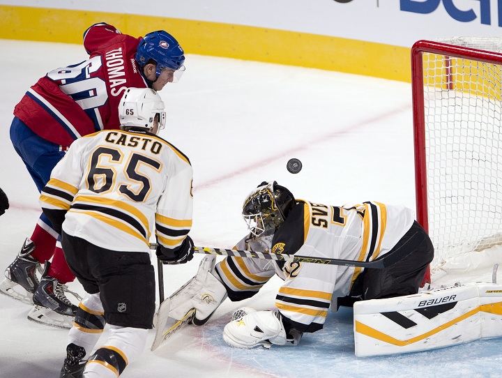 Montreal Canadiens right wing Christian Thomas (60) scores the second goal against Boston Bruins goalie Niklas Svedberg (72) as Boston Bruins defenseman Chris Casto (65) looks on during second period pre-season National Hockey League action Tuesday, September 23, 2014 in Montreal.