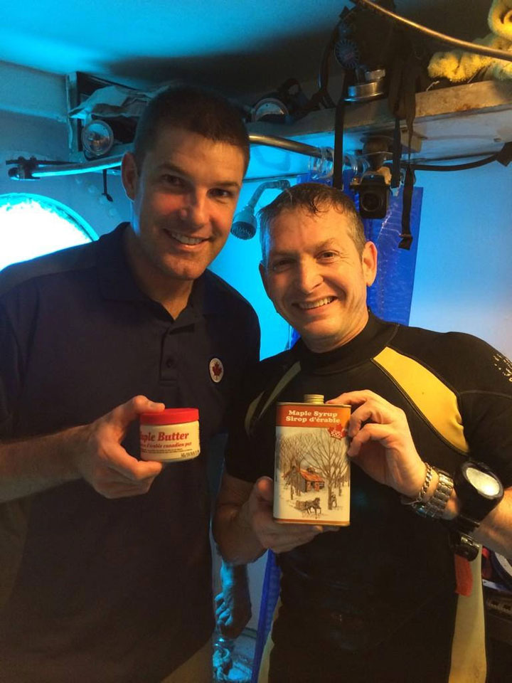 Mmm. Maple syrup. It doesn’t get more Canadian than that.  Jeremy Hansen got a surprise visit and a treat from diver Major Jonathan Knaul of the Royal Canadian Air Force.