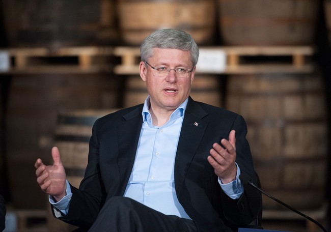 Prime Minister Stephen Harper speaks during a roundtable discussion at Forty Creek Distillery in Grimsby, Ont on Thursday, Sept. 18, 2014. THE CANADIAN PRESS/Hannah Yoon.