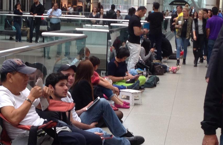 The lineup outside of the Apple Store at the Eaton Centre in Toronto
