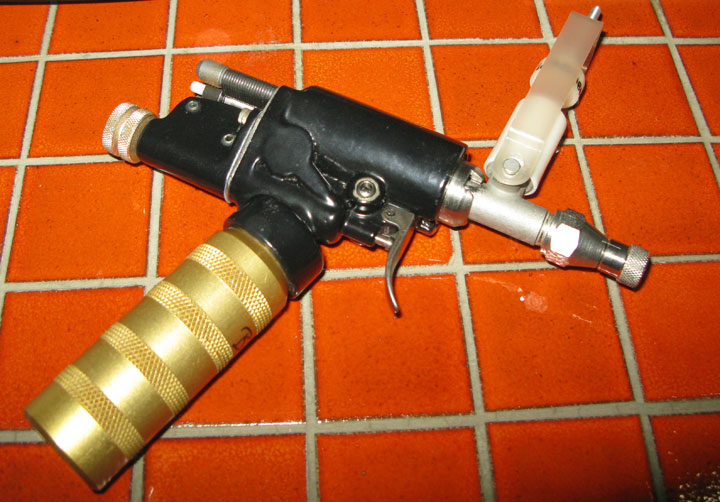 An early version of a vaccination gun, circa 1980.