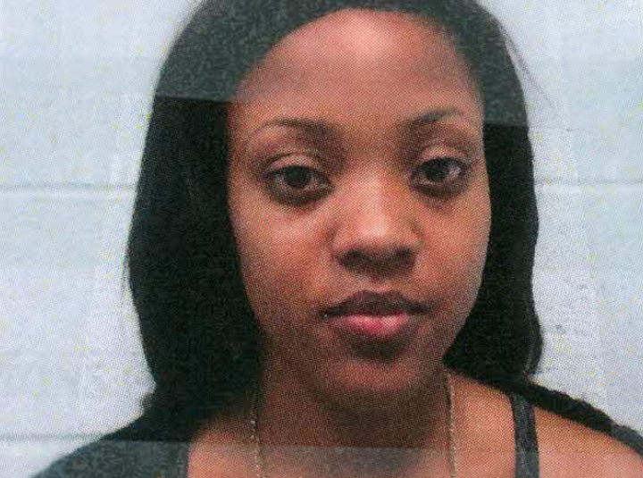 Nyesha McPherson's mugshot taken after being taken into custody at JFK Airport