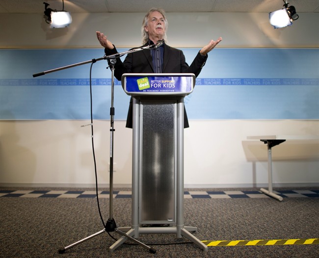 British Columbia Teachers Federation President Jim Iker addresses a news conference in Vancouver, Monday, Sept. 8, 2014. THE CANADIAN PRESS/Jonathan Hayward.