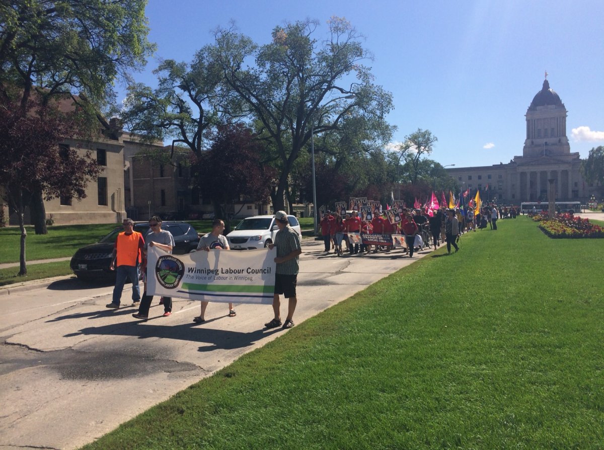 The Labour Day march made its way through Winnipeg streets on September 1, 2014.