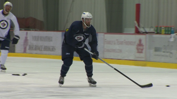Winnipeg Jets captain Andrew Ladd skates at the MTS Iceplex Tuesday.